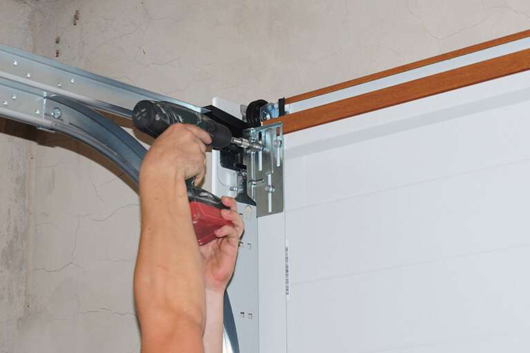 how to fix garage door cable